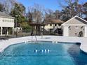Inviting community pool with clear water and plenty of space for relaxation and recreation at 820 9Th Ave. S, North Myrtle Beach, SC 29582
