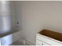 Bathroom features a bathtub with tile surround and a vanity cabinet with drawers ready for customization at 1013 Jase Dr., Longs, SC 29568