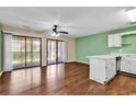 Open kitchen adjacent to living room featuring bright white cabinets and stainless appliances at 1881 Colony Dr. # 8-P, Surfside Beach, SC 29575