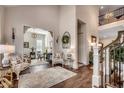 Bright foyer featuring stylish decor, hardwood flooring, and a glimpse into the adjacent living spaces at 1006 James Island Ave., North Myrtle Beach, SC 29582