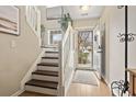 Inviting entryway with wood floors and stairs at 1024 Stanton Pl. # 1024, Myrtle Beach, SC 29579