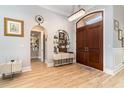 Grand entryway with wood floors, arched doorway and modern accents at 601 Tradewind Ct., North Myrtle Beach, SC 29582