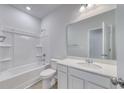Clean bathroom featuring a tub/shower, white vanity with sink, and large mirror at 495 Wagner Cir., Conway, SC 29526