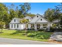 Beautiful home featuring a well-manicured lawn at 595 Wilcox Ave., Murrells Inlet, SC 29576