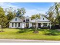 Beautiful home featuring a well-manicured lawn at 595 Wilcox Ave., Murrells Inlet, SC 29576