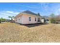 Lovely backyard featuring a well-manicured lawn at 9827 Simonton Ct., Murrells Inlet, SC 29576