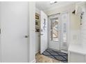 Bright entryway featuring storage, white trim, and a view to the outside deck at 1095 Plantation Dr. W # 27M, Little River, SC 29566
