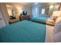 A comfortable room featuring two beds, TV, and a full-length mirror; ideal for relaxation and convenience at 1105 S Ocean Blvd. # 1106, Myrtle Beach, SC 29577