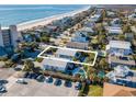 Stunning aerial view showcasing the property's proximity to the beach and surrounding neighborhood at 162 Norris Dr., Pawleys Island, SC 29585
