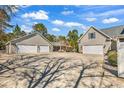 Detached garages with multiple bays offer ample parking and storage, perfect for car enthusiasts at 182 Duck Blind Trail, Myrtle Beach, SC 29588