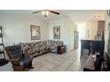 Comfortable living room featuring tile floors and a ceiling fan at 259 19Th Ave. S, Myrtle Beach, SC 29577