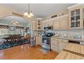 Bright kitchen with updated appliances, granite countertops, and a cozy dining area at 3618 Highway 430, Nichols, SC 29581