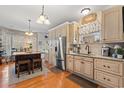 Well-lit kitchen featuring stainless steel appliances, custom cabinets, and eat-in center island at 3618 Highway 430, Nichols, SC 29581