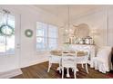 Bright dining area with wood floors, a round table and accent lighting at 622 Lorenzo Dr. # 622, North Myrtle Beach, SC 29582