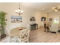 Cozy dining area featuring contemporary decor, wood floors, and an abundance of natural light at 845 Hall Lane # B, Myrtle Beach, SC 29577