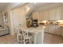 Spacious kitchen features white cabinets, stainless steel appliances, and a large center island at 845 Hall Lane # B, Myrtle Beach, SC 29577