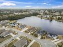 Breathtaking aerial view showcasing the waterfront homes, serene lake, and lush greenery surrounding the property at 1012 Dowitcher Dr., Conway, SC 29526