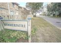 Community sign with the name 'Summerfayre' and the number '210', surrounded by lush greenery at 210 25Th Ave. S # 26, Myrtle Beach, SC 29577
