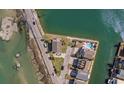 Aerial view of waterfront homes with pools and canal access at 310 37Th Ave. N, North Myrtle Beach, SC 29582