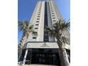 View of Renaissance Tower entrance, featuring palm trees and elegant signage at 5905 South Kings Hwy. # 1116, Myrtle Beach, SC 29575