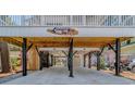 Open ground level parking area with wooden support beams and direct access to the upper level at 6001 - 1527 S Kings Hwy., Myrtle Beach, SC 29575