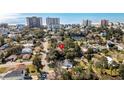 An aerial view shows the property's proximity to the beach, local pond, and surrounding neighborhood in a scenic setting at 509 14Th Ave. S, North Myrtle Beach, SC 29582