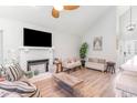 Inviting living room featuring a fireplace, comfortable seating, and stylish accents at 717 41St Ave. S, North Myrtle Beach, SC 29582