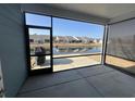 Screened patio with a view of the pond and nearby homes at 5834 Cremona Dr., Myrtle Beach, SC 29577