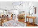 Spacious living room with hardwood floors, high ceilings, and elegant furnishings at 728 Camden Circle, Pawleys Island, SC 29585