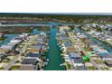 Aerial view of homes lining waterway, showing multiple docks for boating and waterfront enjoyment at 325 52Nd Ave. N, North Myrtle Beach, SC 29582