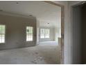 Spacious living room with windows offering natural light and scenic views at 2921 Hughes Gasque Rd., Aynor, SC 29511