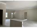 Bright, unfinished living room featuring large entry and an additional room entry at 2925 Hughes Gasque Rd., Aynor, SC 29511