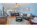 Cozy living room featuring hardwood floors, neutral colors, and comfortable seating at 4503 W Harbour Ct. # S-12, Little River, SC 29566