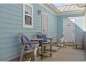 Cozy patio with comfortable seating, perfect for outdoor relaxation at 514 Vallecrosia Ct., Little River, SC 29566