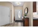Welcoming foyer features ceramic tile flooring and a decorative front door at 822 Foxtail Dr. # 822, Longs, SC 29568