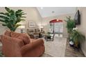 Cozy living room with warm tones, comfortable seating, and lots of natural light at 822 Foxtail Dr. # 822, Longs, SC 29568