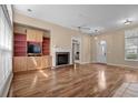 Inviting living room featuring a cozy fireplace, wood floors and classic trim at 192 Berkshire Loop, Pawleys Island, SC 29585