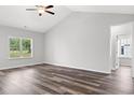 Serene bedroom with wood floors, large windows, and neutral colors, providing a peaceful retreat at 72 Millsite Ct., Georgetown, SC 29440