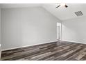 Bright bedroom featuring wood floors, neutral paint, vaulted ceiling and ample natural light at 72 Millsite Ct., Georgetown, SC 29440