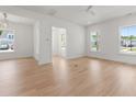 Bright living room featuring hardwood floors and an abundance of natural light at 738 Macon Alley, Myrtle Beach, SC 29588