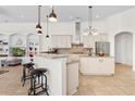 Spacious kitchen featuring granite countertops, an island with bar seating, and stainless steel appliances at 156 Henry Middleton Blvd., Myrtle Beach, SC 29588