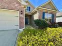 Well maintained home featuring a two-car garage and manicured landscaping at 1612 Fairforest Ct., Conway, SC 29526