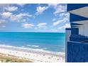 Breathtaking ocean view from the balcony with blue water extending to the horizon on a sunny day at 2001 S Ocean Blvd. # 1505, Myrtle Beach, SC 29577