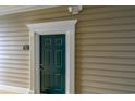 Close-up of unit door with decorative molding at 244 Sun Colony Blvd. # 102, Longs, SC 29568