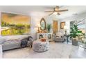Bright living room with unique decor, artwork and natural light at 276 Salt Marsh Circle # 4D, Pawleys Island, SC 29585