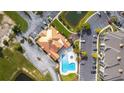Aerial view of the community pool and clubhouse, showing the layout of the amenities at 395 S Crow Creek Dr. # 1708, Calabash, NC 28467