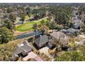 Beautiful aerial shot of home next to a golf course and pond at 749 Club Circle, Pawleys Island, SC 29585