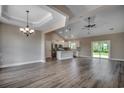 Spacious open-concept living area with modern flooring and abundant natural light at 646 Sunny Pond Ln., Aynor, SC 29511