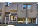 Charming two-story townhouse featuring convenient covered parking and an inviting entrance at 121 Osprey Watch Circle # 9-C, Pawleys Island, SC 29585