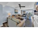 Sun-filled living room with stylish furniture and an inviting atmosphere at 121 Osprey Watch Circle # 9-C, Pawleys Island, SC 29585